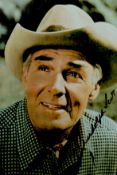 American Actor Randolph Scott Signed 6 x 4 inch Colour Photo. Signed in black ink. Good Condition.