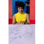 Dilys Laye signed 8x6 album page dedicated and 7x5 vintage Carry on colour photo.. All autographs