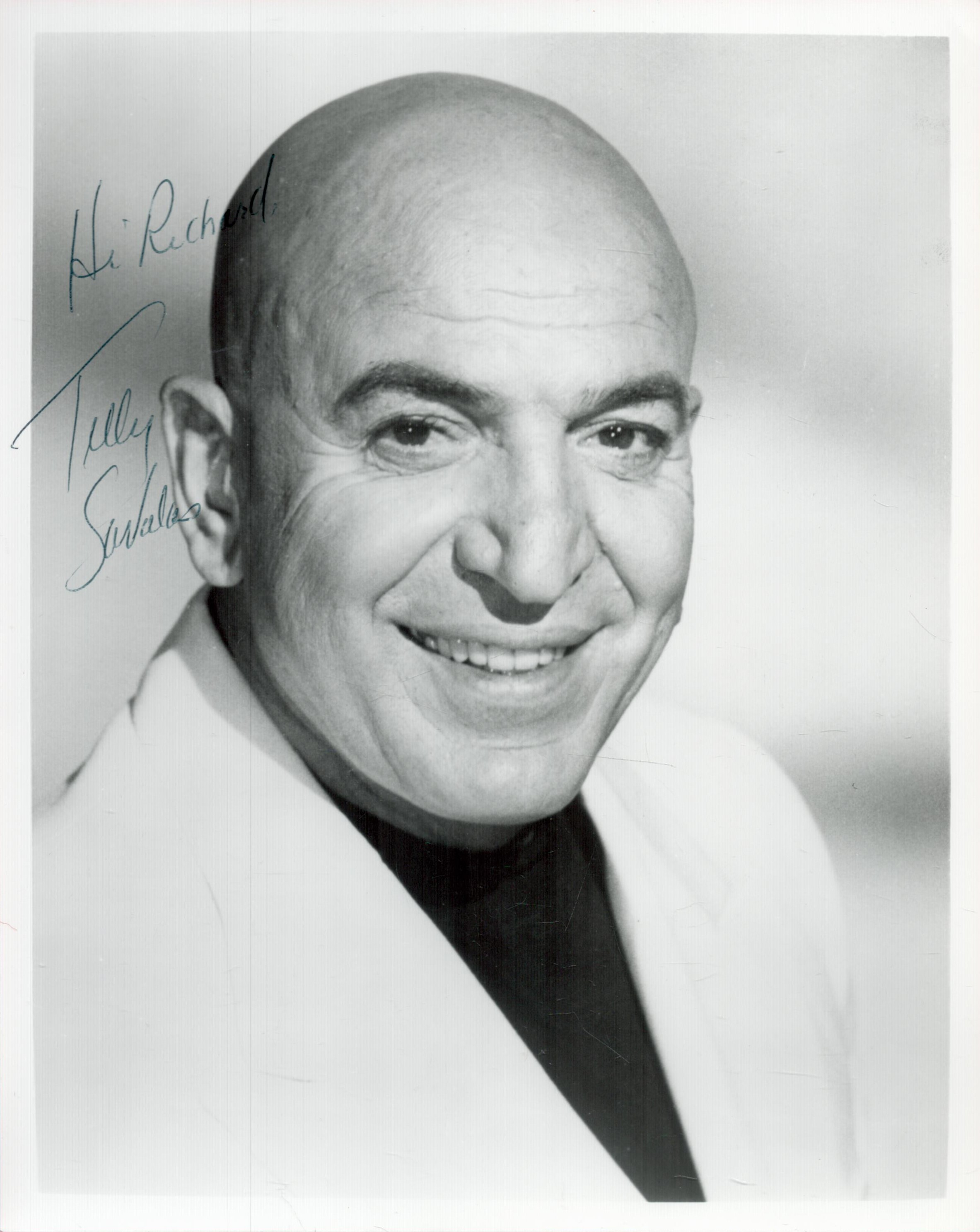 Telly Savalas Signed 10x8 inch Black and White Photo. Signed in black biro, Dedicated. Good