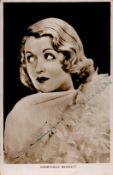 Constance Bennett Signed 5x3 inch approx black and white photo. Signed in blue ink. Good