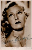 Lilian Harvey Signed 5x3 inch Black and White Photo. Signed in blue ink. Good Condition. All