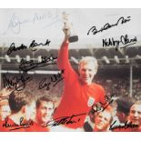 1966 World Cup complete team signed colour 8.5 x 7.5 photo celebrating at Wembley after the final.