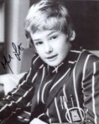 Melody 1980's children's movie photo signed by actor Mark Lester 8x10 photo. All autographs come