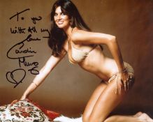 007 Bond girl Caroline Munro signed on all fours bikini 8x10 photo. All autographs come with a