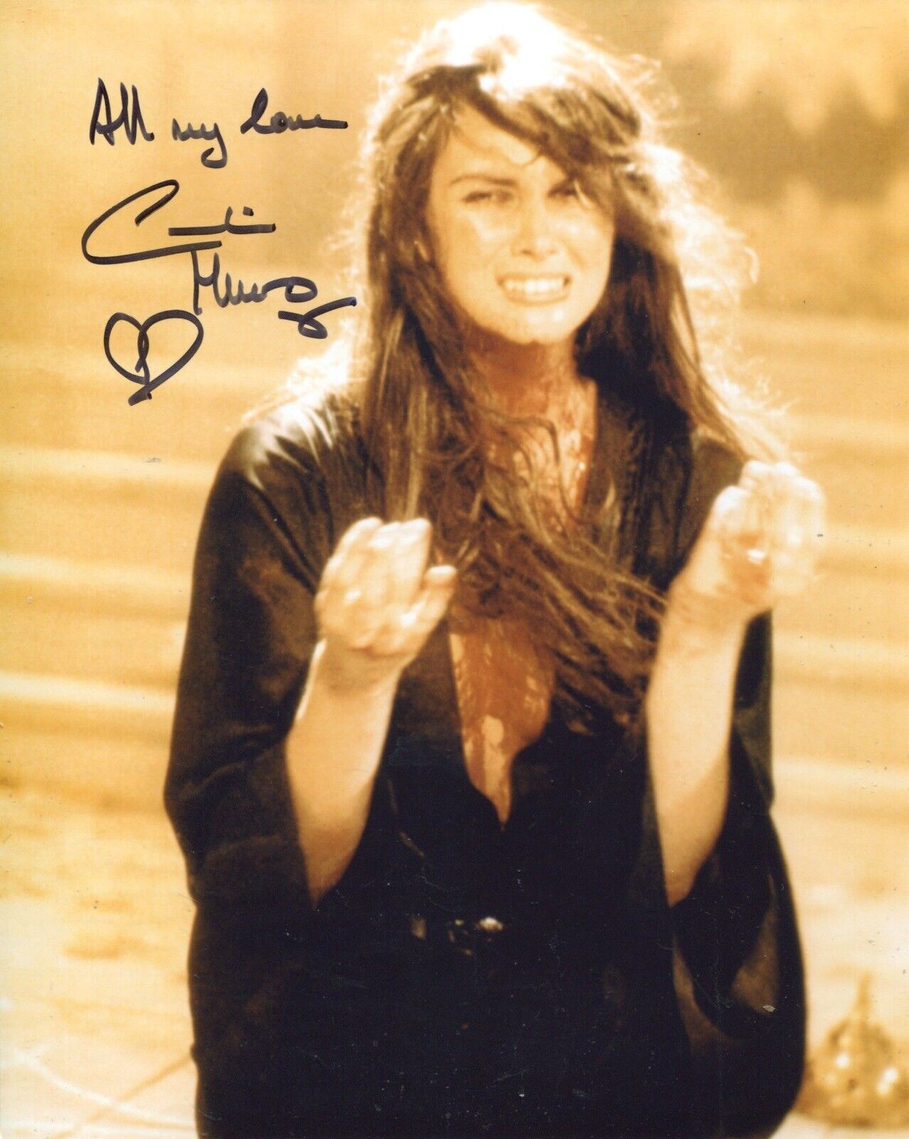 007 Bond girl Caroline Munro signed movie scene 8x10 photo. All autographs come with a Certificate