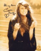 007 Bond girl Caroline Munro signed movie scene 8x10 photo. All autographs come with a Certificate