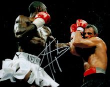Boxing. WBO Champion Johnny Nelson Signed 10x8 inch Colour Photo. Signed in silver ink. Good