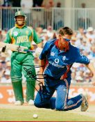 Cricketer Ashley Giles Hand signed 10x8 Colour Photo showing Giles in action for England Cricket