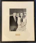 Jackie Collins Signed Black and White Photo, Housed in a Frame Measuring 14 x 12 inches overall.