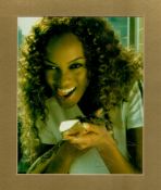 Tyra Banks signed 12x10 overall mounted colour photo. Good Condition. All autographs come with a