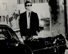 Ryan O'Neal signed 10x8 black and white photo pictured from the film "Driver". Good Condition. All