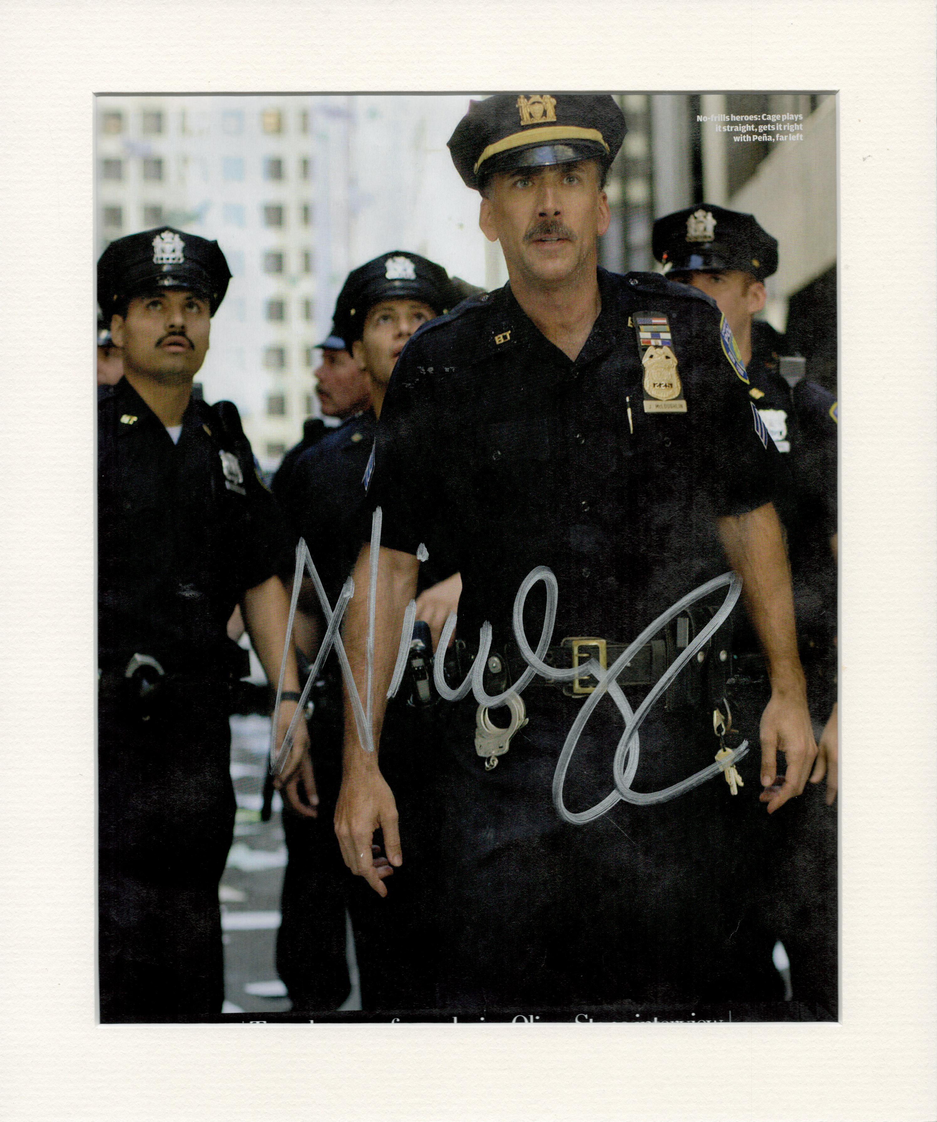 Nicolas Cage signed 12x10 overall mounted colour magazine photo. Good Condition. All autographs come