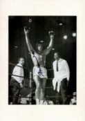 Muhammad Ali signed 12x8 overall mounted black and white photo. Good Condition. All autographs