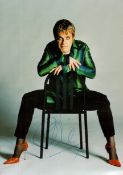 Eddie Izzard Signed 8 x 6 inch Colour Promo Photo. Signed in blue ink. Good Condition. All