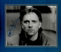 Rik Mayall signed 12x10 overall mounted black and white photo. Good Condition. All autographs come