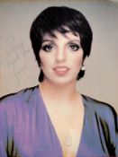 Liza Minnelli Signed 12 x 9 approx Colour Magazine Cutting Page. Signed in blue ink, Dedicated. Fair