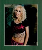 Christina Aguilera signed 12x10 overall mounted colour photo. Good Condition. All autographs come