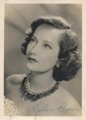 Merle Oberon Signed 7 x 5 inch vintage Black and White Photo. Signed in blue ink. Good Condition.