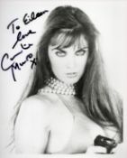 Caroline Munro Signed 10x8 inch Black and White Dedicated Photo. Signed in black ink. Good