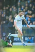 Football Stuart Dallas signed Leeds United 12x8 colour photo. Good Condition. All autographs come