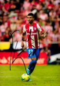 Football Reinildo Mandava signed Athletico Madrid 12x8 colour photo. Good Condition. All