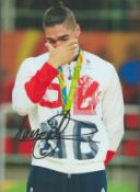 Olympics Louis Smith signed 12x8 colour photo. Louis Antoine Smith MBE (born 22 April 1989) is a