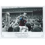 Football. Trevor Brooking Signed 16x12 colourised photo. Autographed editions, Limited edition.