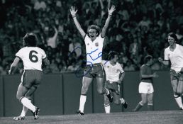 Autographed Phil Thompson 12 X 8 Photo : B/W, Depicting England's Phil Thompson Running Away In
