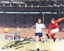 Football. Geoff Hurst Signed 10x8 colour photo. Photo shows the Hurst Shooting for goal against West
