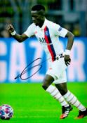 Football Idrissa Gueye signed Paris St Germain 12x8 colour photo. Good Condition. All autographs