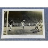 Football, Peter McParland signed 12x18 black and white photograph picturing McParland, playing for