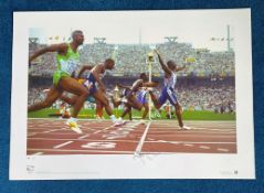 Linford Christie signed 22x16 colour Team GB Olympic Gold Big Blue Tube print. Linford Christie