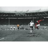 Football Sir Geoff Hurst signed 16x12 1966 World Cup Final colour photo. Good Condition. All