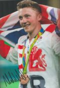 Olympics Nile Wilson signed 12x8 colour photo. Nile Michael Wilson (born 17 January 1996) is a