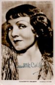 Claudette Colbert Signed 5x3 inch Black and White Photo. Signed in blue ink. Good Condition. All