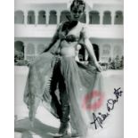 Alison Worth signed 10 x 8 inch b/w photo, with Pink lipstick kiss added. James Bond 007 actress.