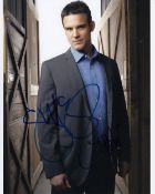 Blowout Sale! Warehouse 13 Eddie McClintock hand signed 10x8 photo. This beautiful 10x8 hand