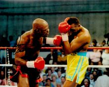 Iran Barkley signed 10x8 colour photo pictured during his fight with Thomas Hearns. Good