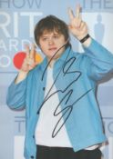 Lewis Capaldi signed 12x8 colour photo. Good Condition. All autographs come with a Certificate of