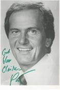 Pat Boone signed 7x5 black and white photo. Good Condition. All autographs come with a Certificate