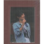 One Direction Star Louis Tomlinson Signed large Colour photo in blue ink. Mounted to an overall size