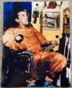 Bernard Cribbins signed 10 x 8 inch colour The Mouse on the Moon photo in orange space suit. Good