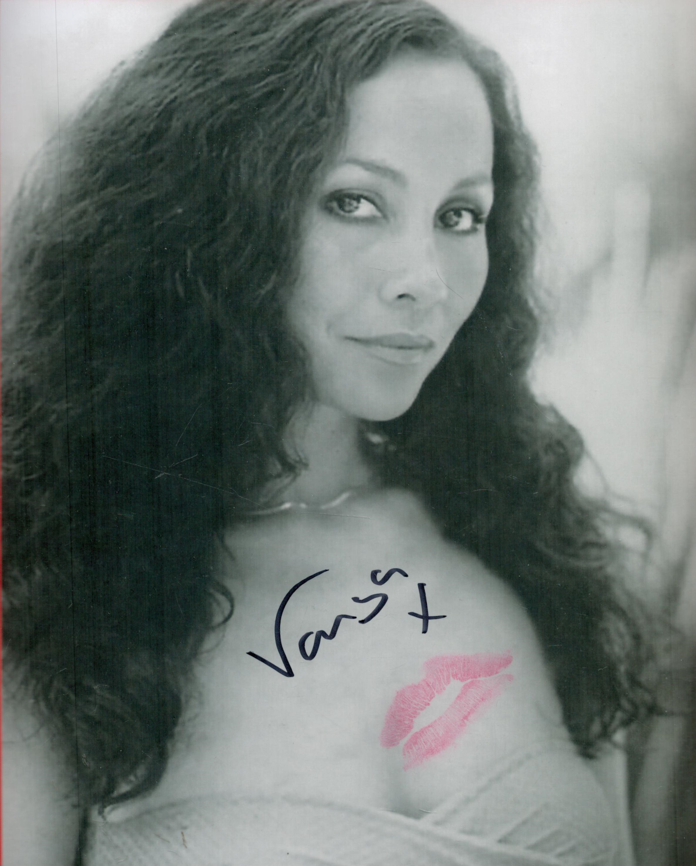 James Bond actress and Model Vanya signed 10 x 8 inch b/w photo, with Pink lipstick kiss added. Good