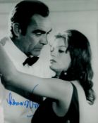 Plenty O'Toole Lana Wood signed 10 x 8 inch b/w photo embracing Sean Connery. Good Condition. All