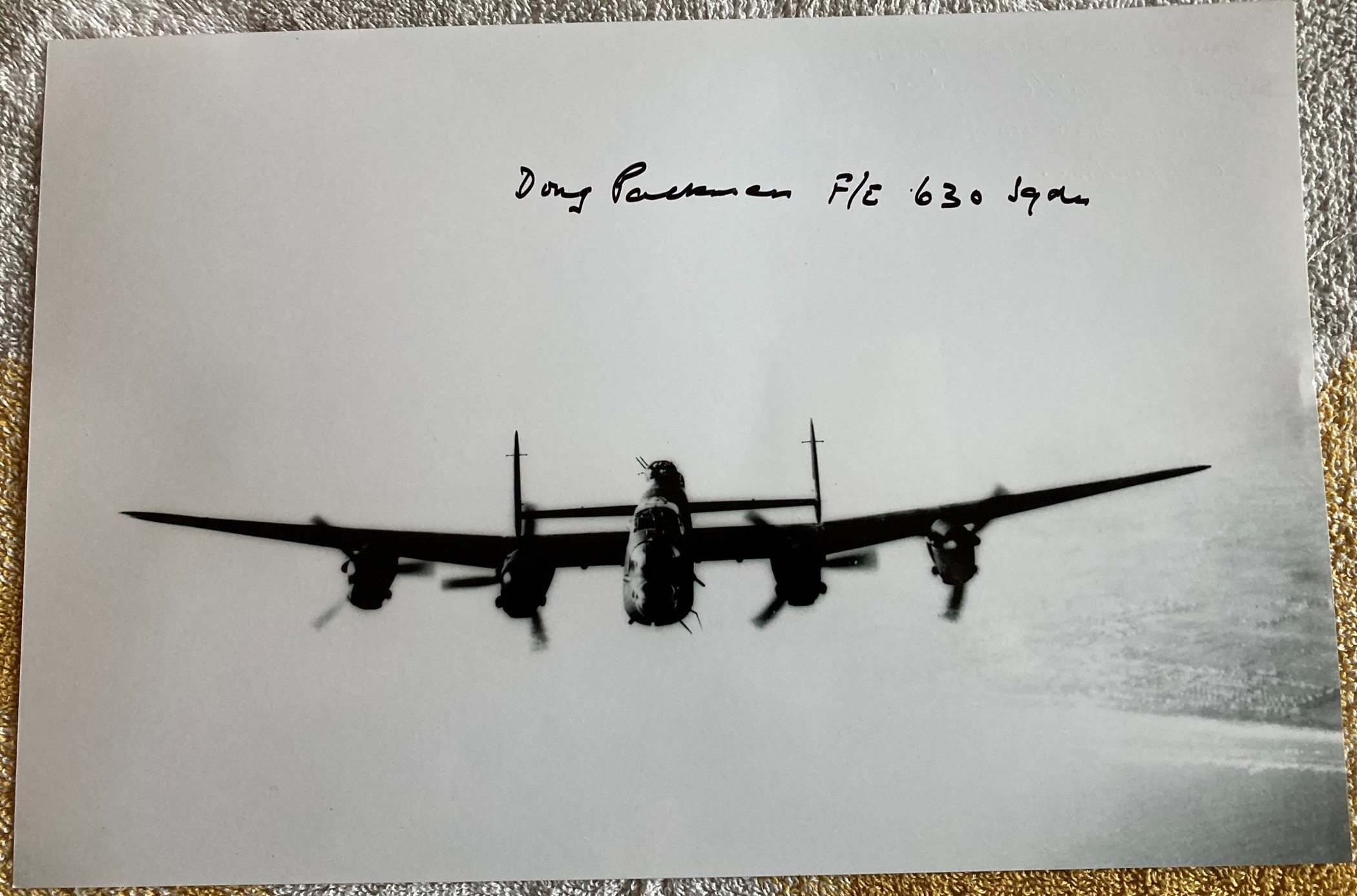 WW2 Bomber Command veteran Flt Lt Doug Packman 630 sqn signed 12 x 8 inch b/w Lancaster in flight