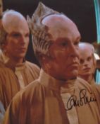 Star Trek Babylon 5 photo signed by actor Guy Siner as Religious 1. Good Condition. All autographs