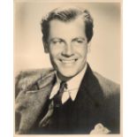 Joel McCrea Signed 10x8 inch Vintage Black and White Photo. Signed in blue ink. Dedicated. Est. Good