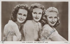Rosemary and Priscilla Lane Signed 5x3 vintage black and white photo. Good Condition. All autographs