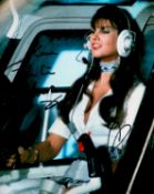 James Bond Caroline Munro signed 10 x 8 inch colour photo in cockpit of the helicopter about to