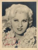 American Actress May West Signed 7x5 inch Black and White Vintage photo. Signed in red ink. . Good